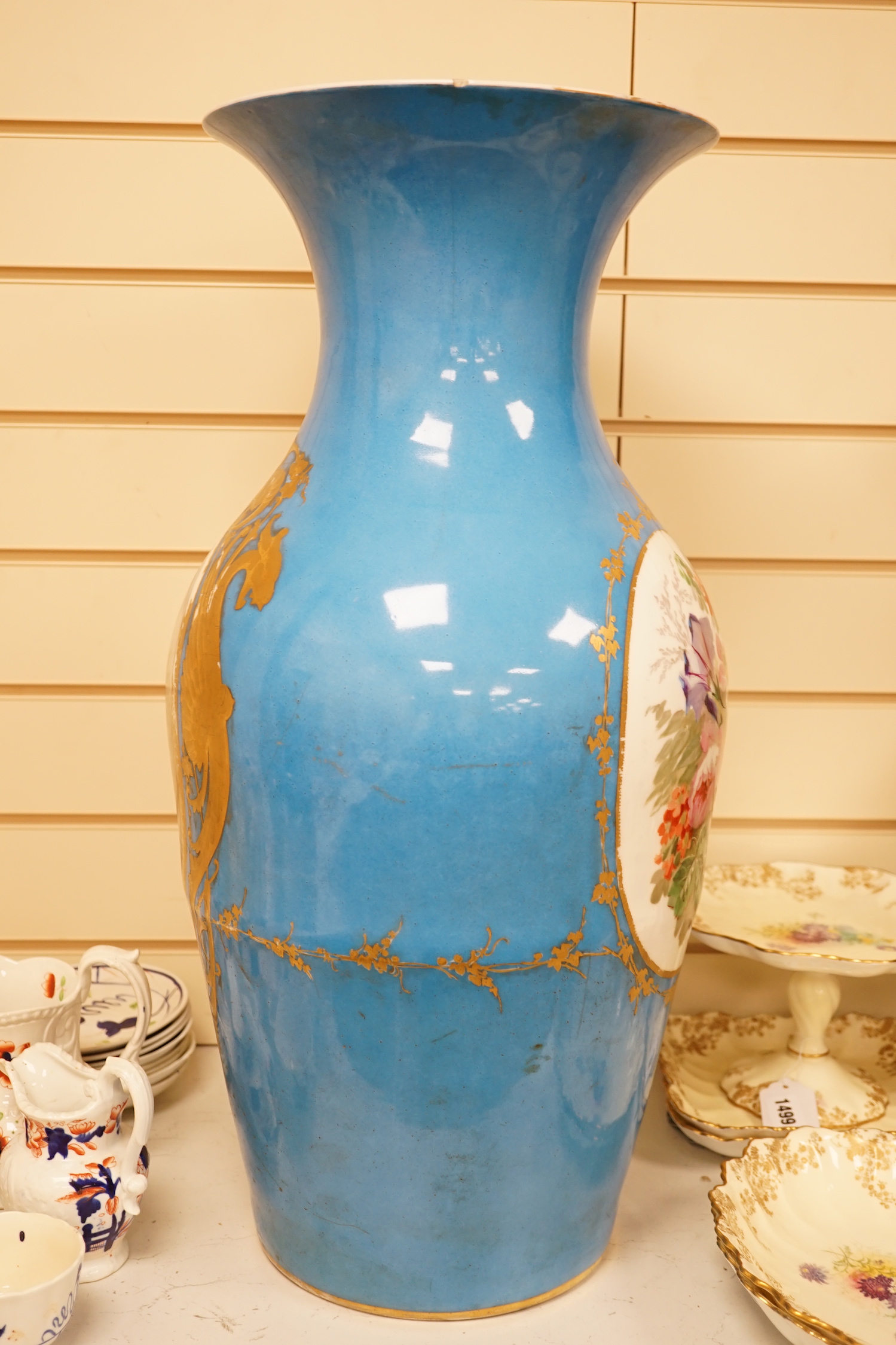 A large 19th century Sevres style blue porcelain decorated vase, 65cm (a.f.)